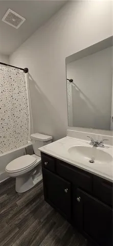 a view of a backyard of the house