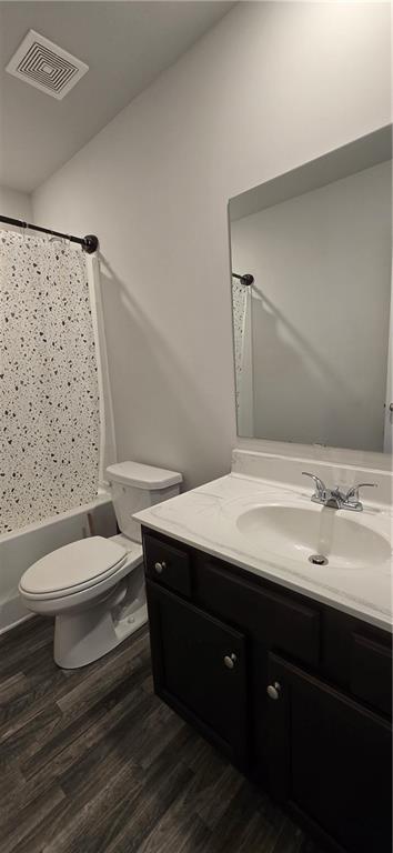 4757 Rdg Vly Drive Gainesville, GA 30504 - Photo 26 of 35 a bathroom with a sink and a toilet