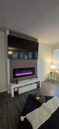a room with furniture and a wooden floor