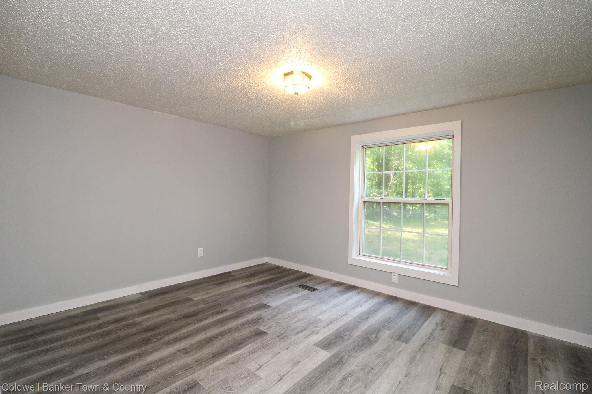 4075 Center Road Linden, MI 48451 - Photo 25 of 28 Bedroom 2