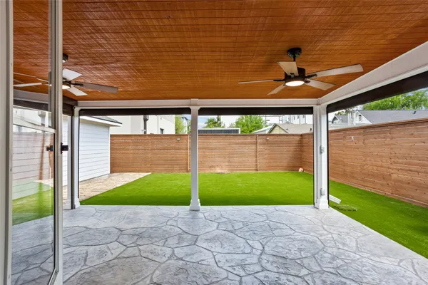 a view of swimming pool with a yard