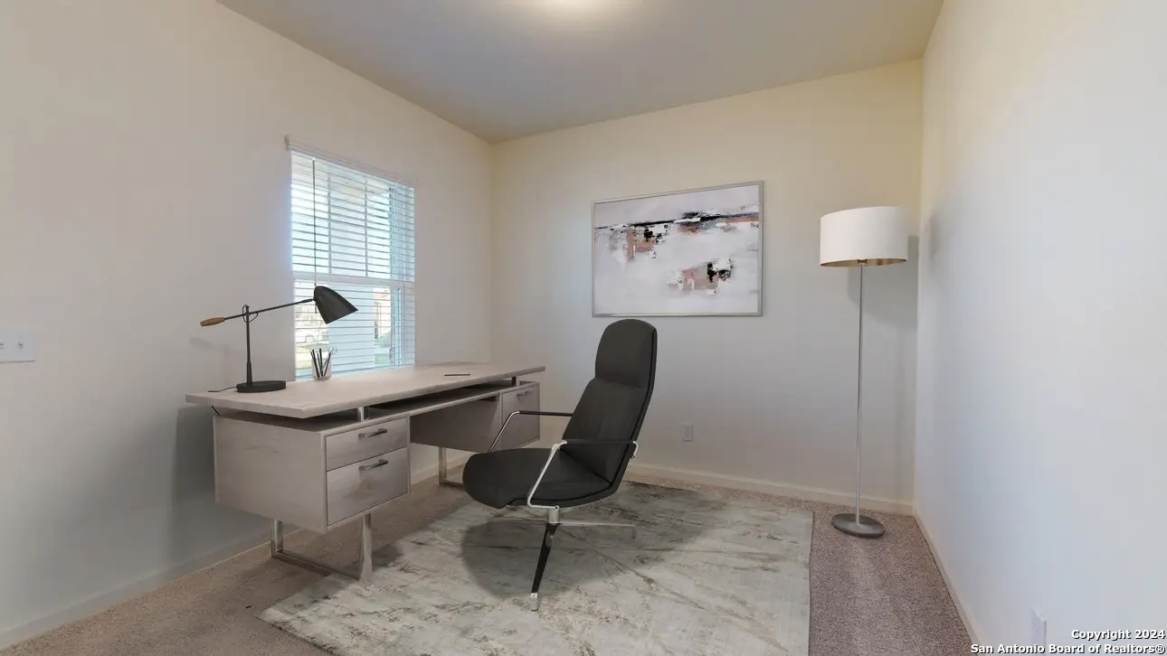 10528 Lesser Snow Adkins, TX 78101 - Photo 2 of 13 a view of a workspace with furniture and window