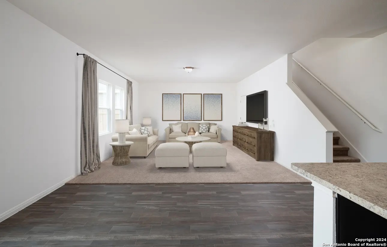 10528 Lesser Snow Adkins, TX 78101 - Photo 7 of 13 a living room with furniture and a flat screen tv