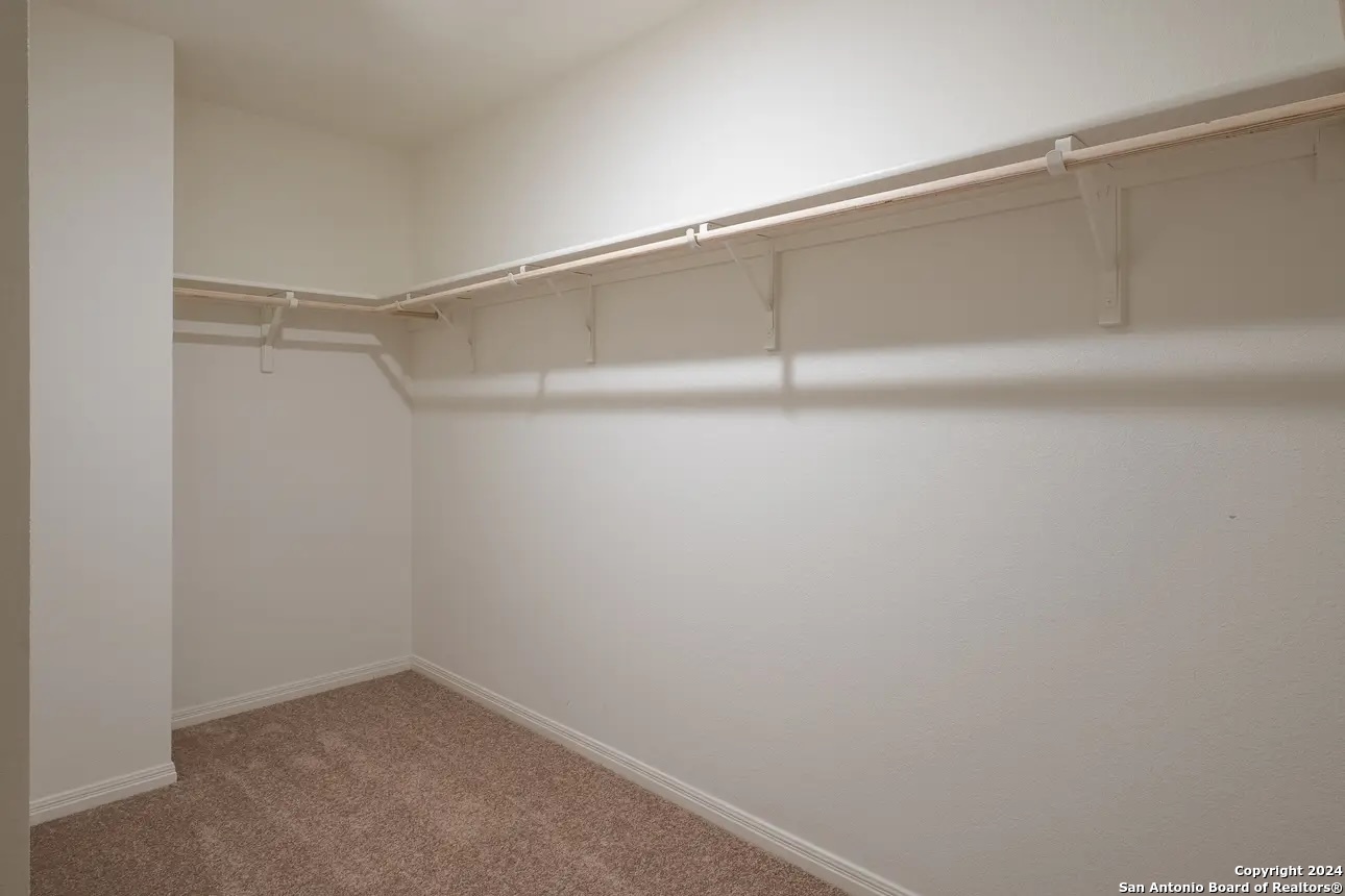 10528 Lesser Snow Adkins, TX 78101 - Photo 10 of 13 a view of an empty walk in closet