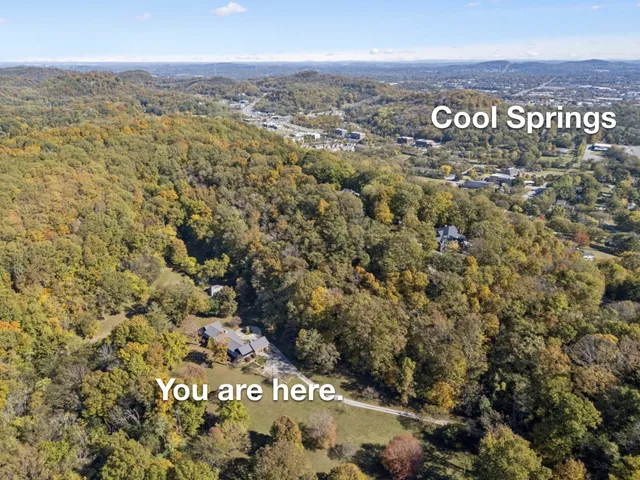 a view of a city with an ocean view
