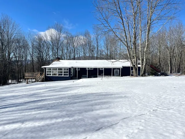 a view of a city with large trees