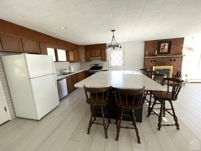 a view of a dining room with furniture