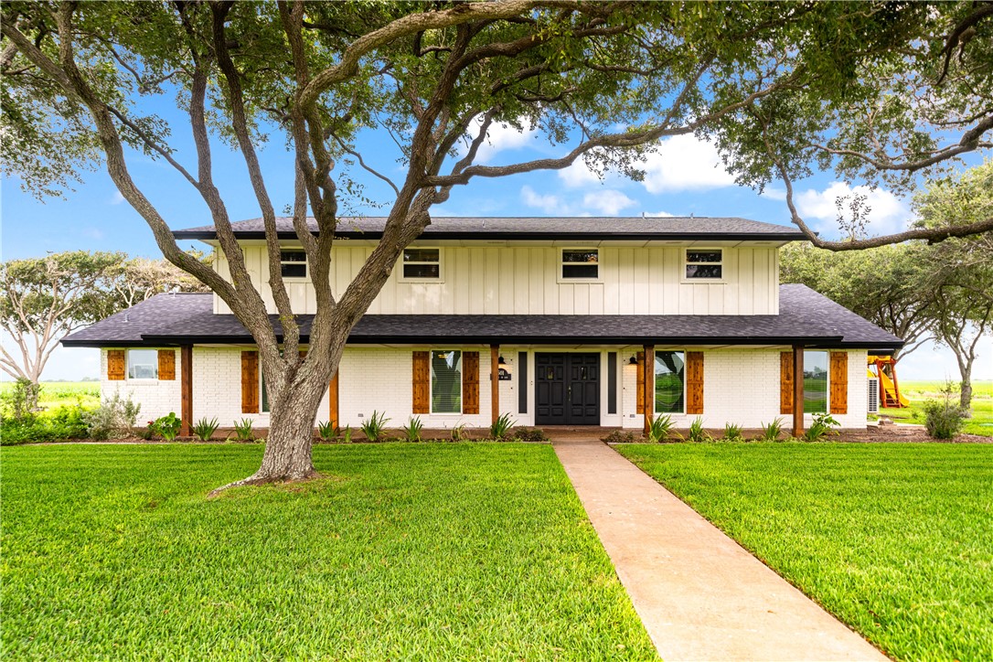 501 South County Road 1140 Riviera, TX 78379 - Photo 1 of 40 Front view of a large ranch-style home featuring e