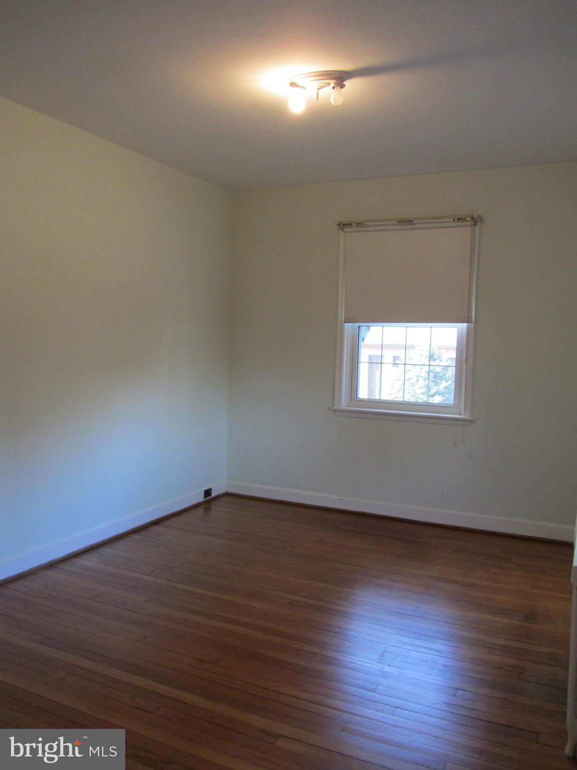 203 Aigburth Road Baltimore, MD 21286 - Photo 12 of 21 3rd Bedroom with Hardwood Flooring