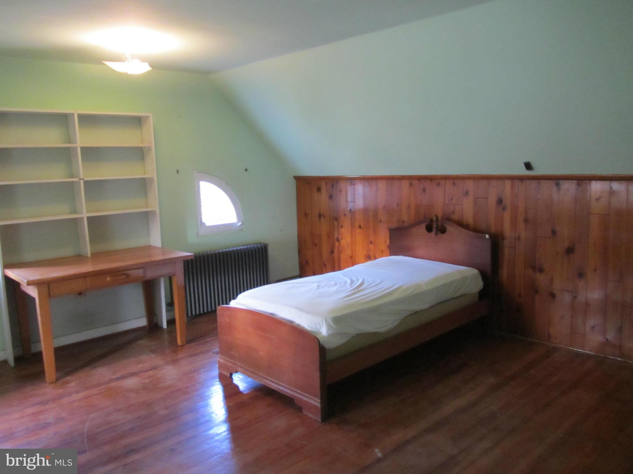 203 Aigburth Road Baltimore, MD 21286 - Photo 15 of 21 5th Bedroom with Hardwood Flooring