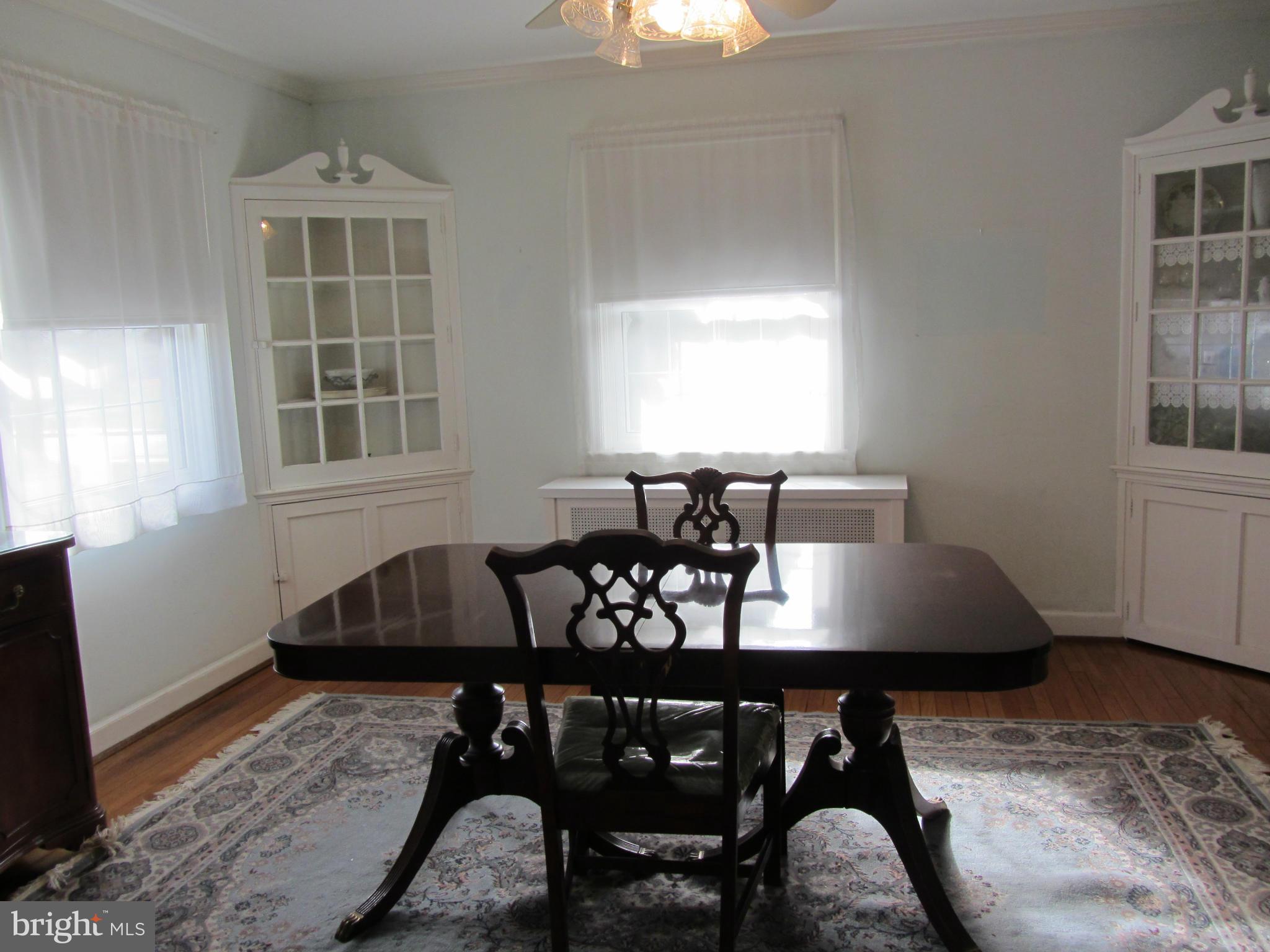 203 Aigburth Road Baltimore, MD 21286 - Photo 5 of 21 Dining Room with Built-in Corner Cabinets