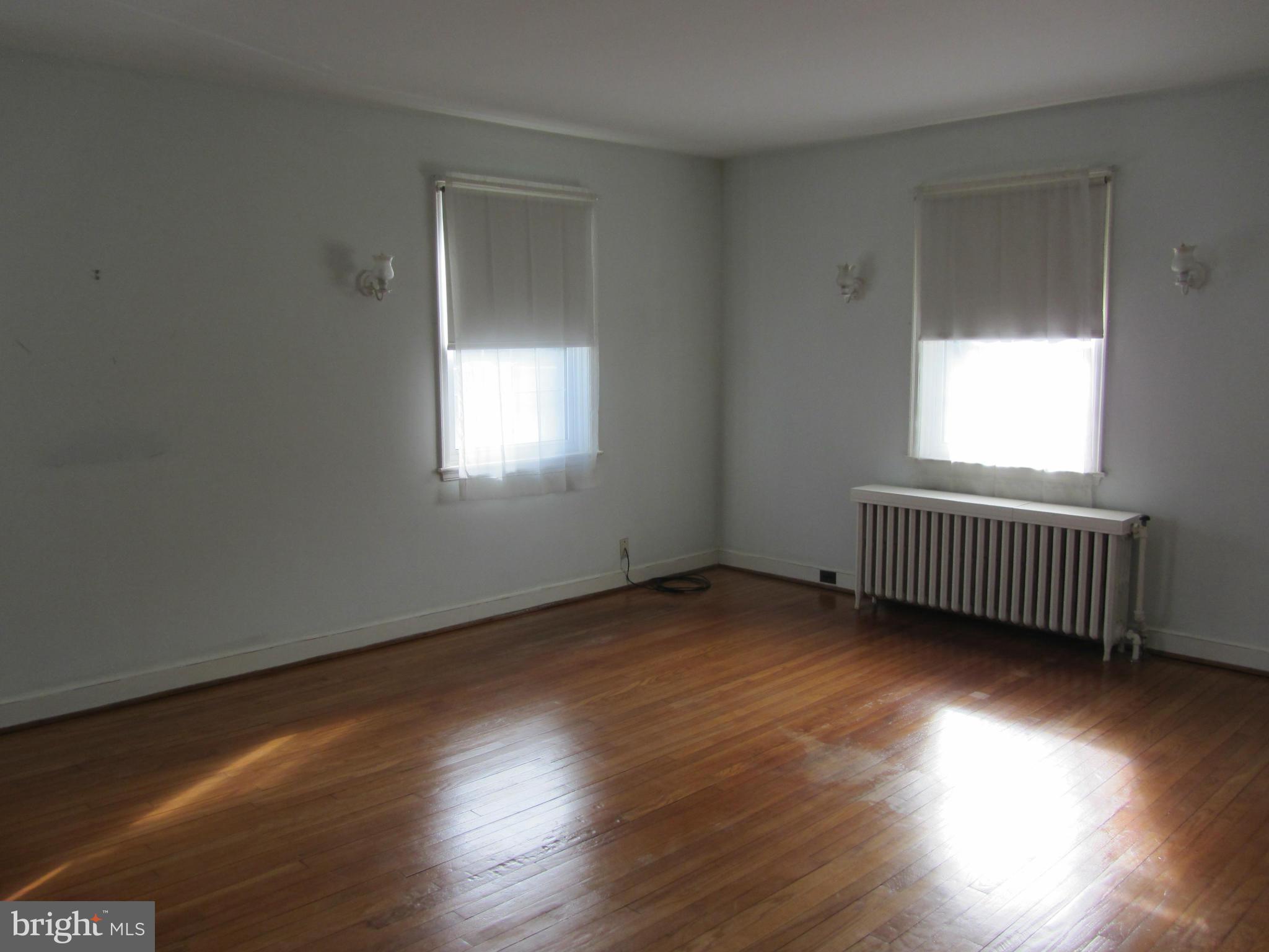 203 Aigburth Road Baltimore, MD 21286 - Photo 10 of 21 Master Bedroom with Hardwood Flooring