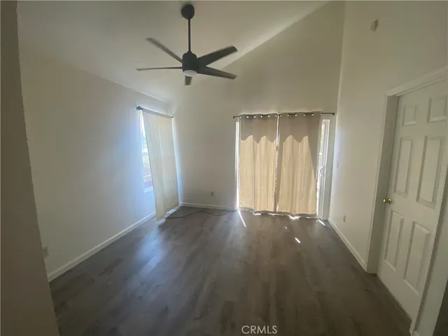 a kitchen with granite countertop stainless steel appliances and wooden cabinets