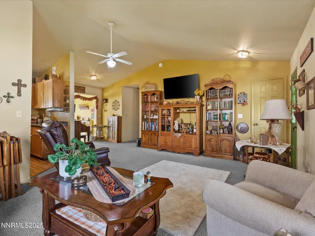 a kitchen with stainless steel appliances granite countertop wooden cabinets stove and a sink