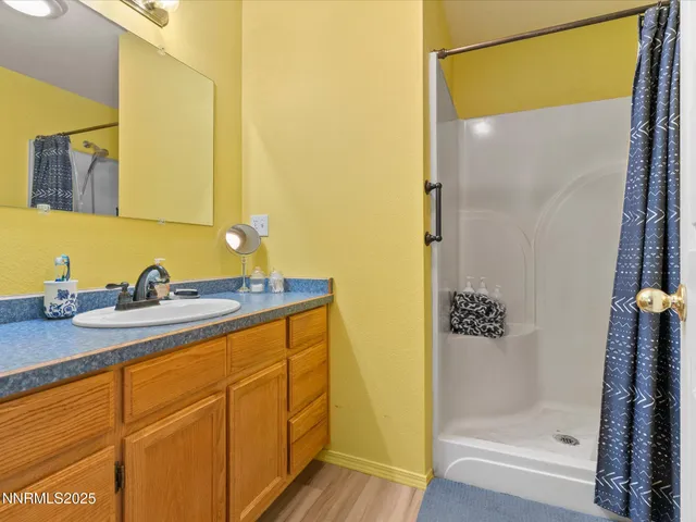 a bedroom with a bed and furniture