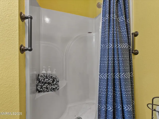 a bedroom with a bed and a cabinets