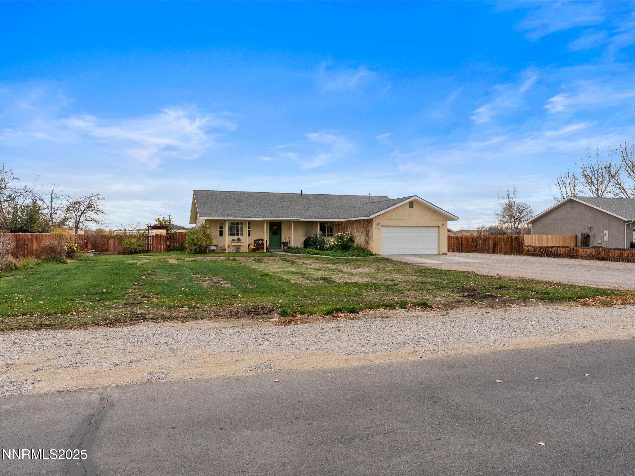 215 Hunter Park Way Fallon, NV 89406 - Photo 3 of 57 a house view with a outdoor space