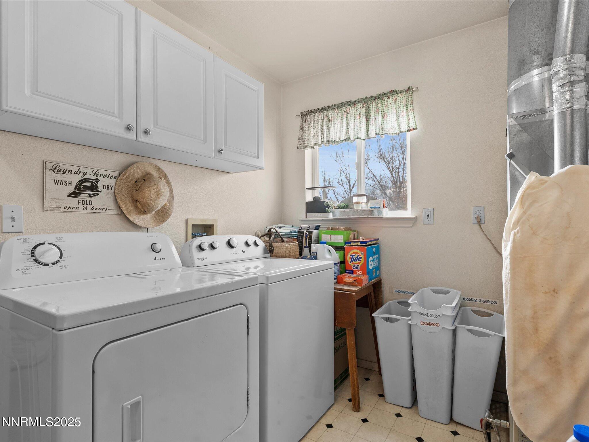 215 Hunter Park Way Fallon, NV 89406 - Photo 31 of 57 a utility room with dryer and washer