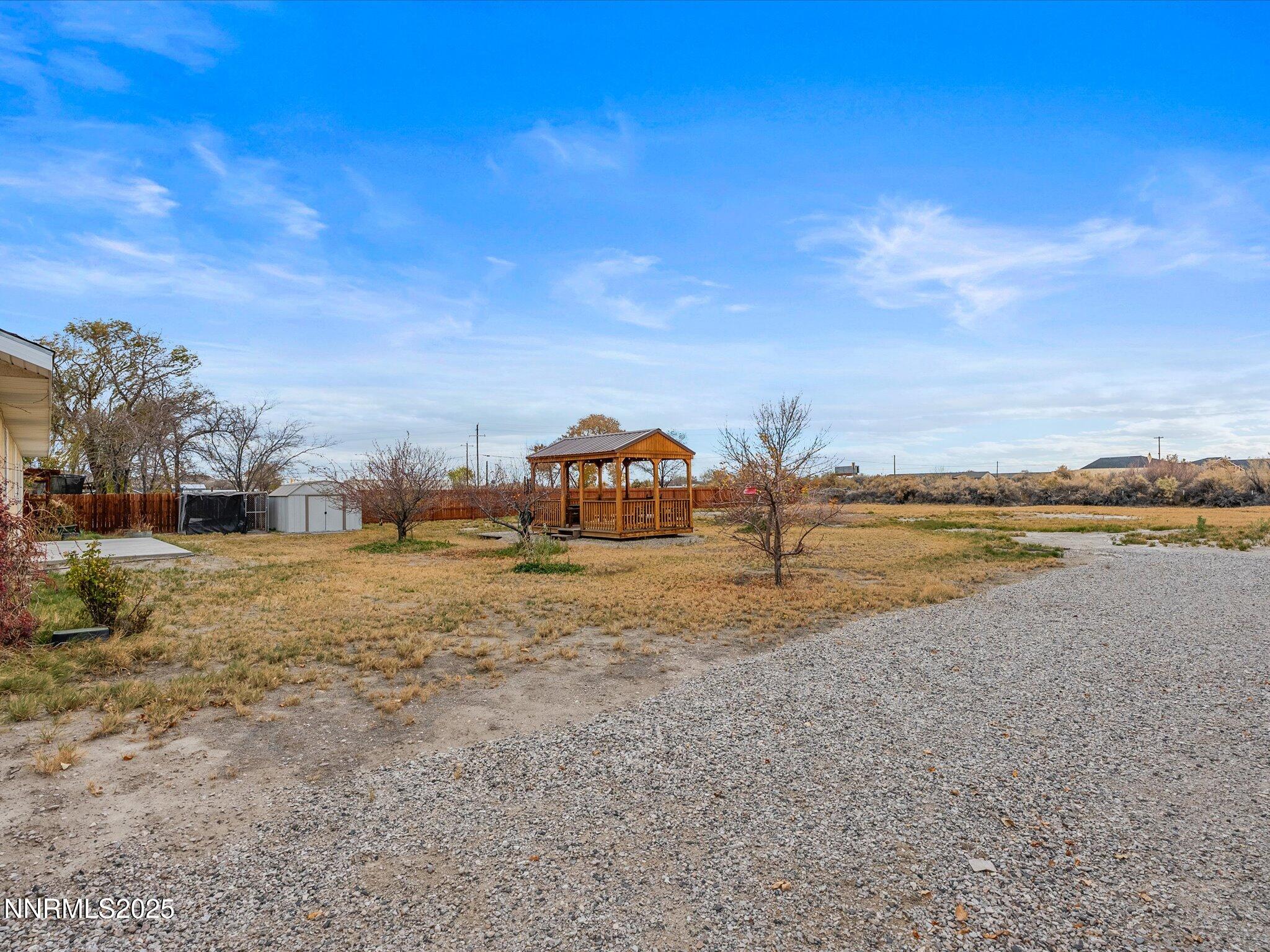 215 Hunter Park Way Fallon, NV 89406 - Photo 32 of 57 a view of a lake with houses