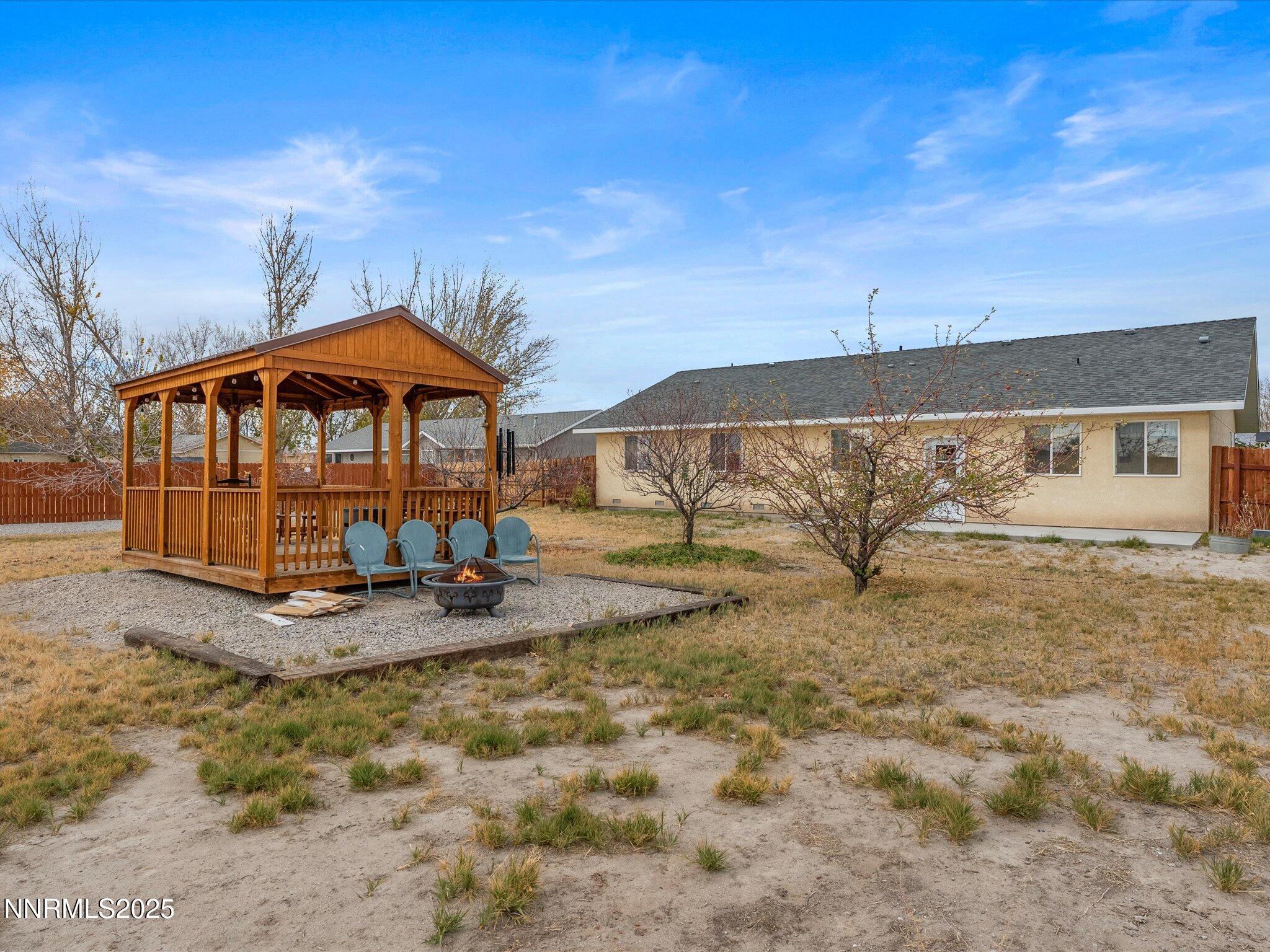 215 Hunter Park Way Fallon, NV 89406 - Photo 35 of 57 a view of a house with backyard and sitting area