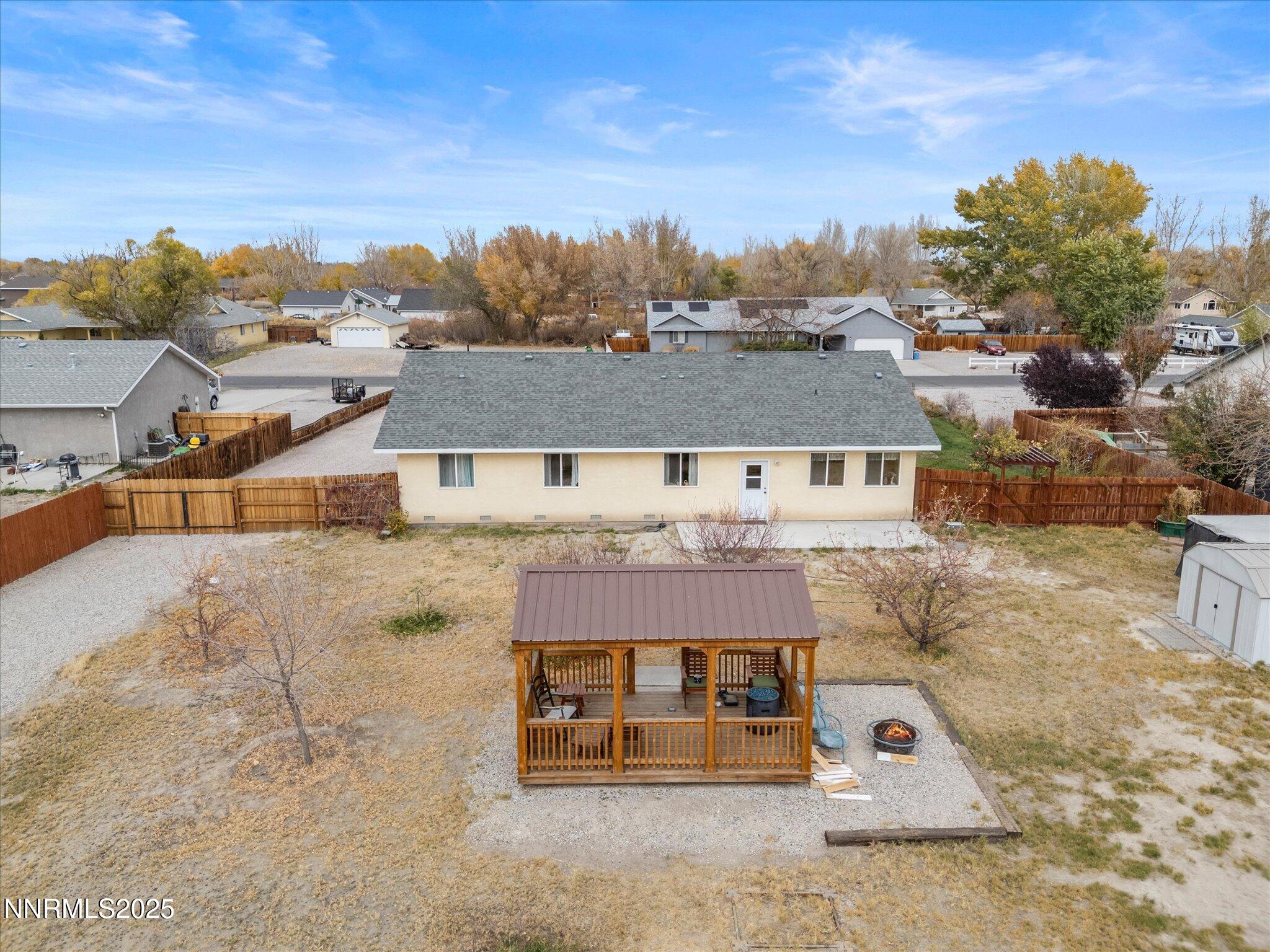215 Hunter Park Way Fallon, NV 89406 - Photo 43 of 57 a view of a big house with a big yard