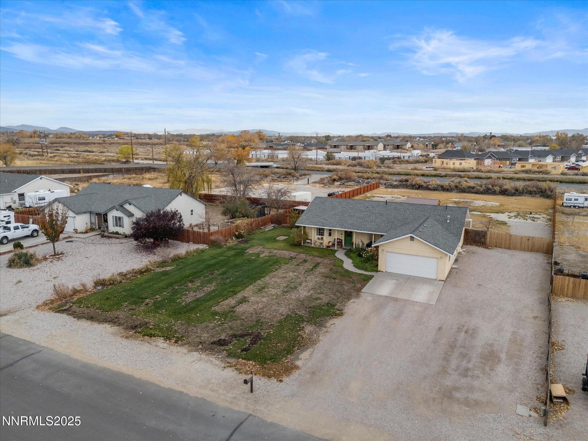 215 Hunter Park Way Fallon, NV 89406 - Photo 47 of 57 an aerial view of a house with a garden