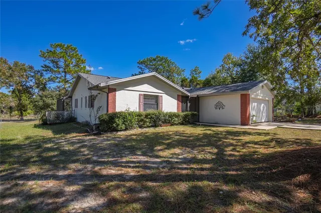 a house view with a outdoor space