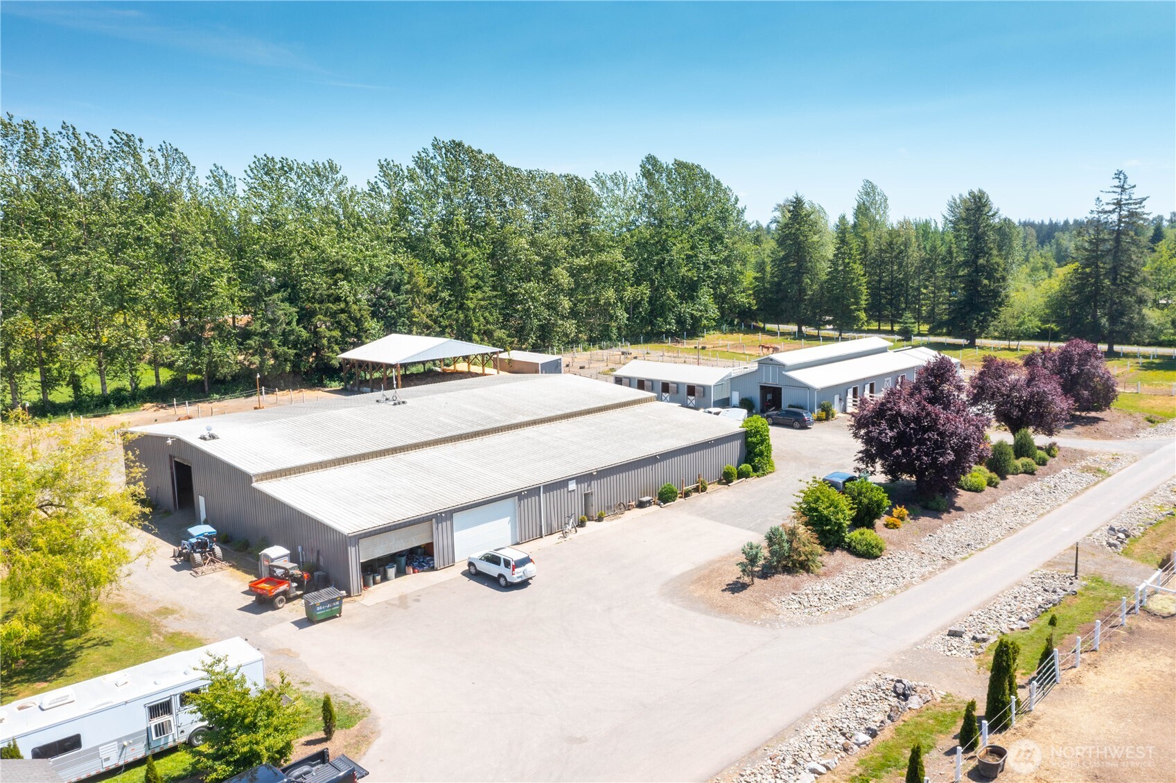 2176 Burk Road Blaine, WA 98230 - Photo 19 of 40 a view of a patio with furniture and a garden
