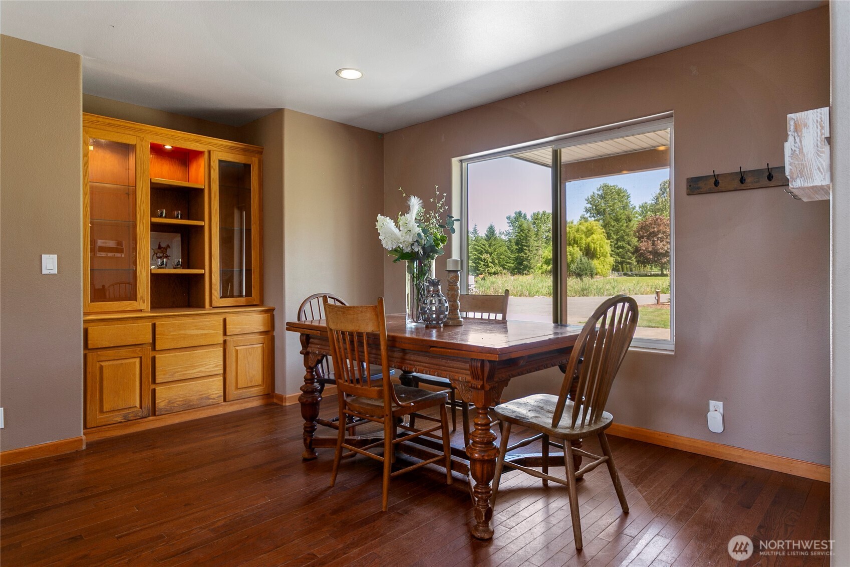 2176 Burk Road Blaine, WA 98230 - Photo 6 of 40 a view of a dining room with furniture window and wooden floor