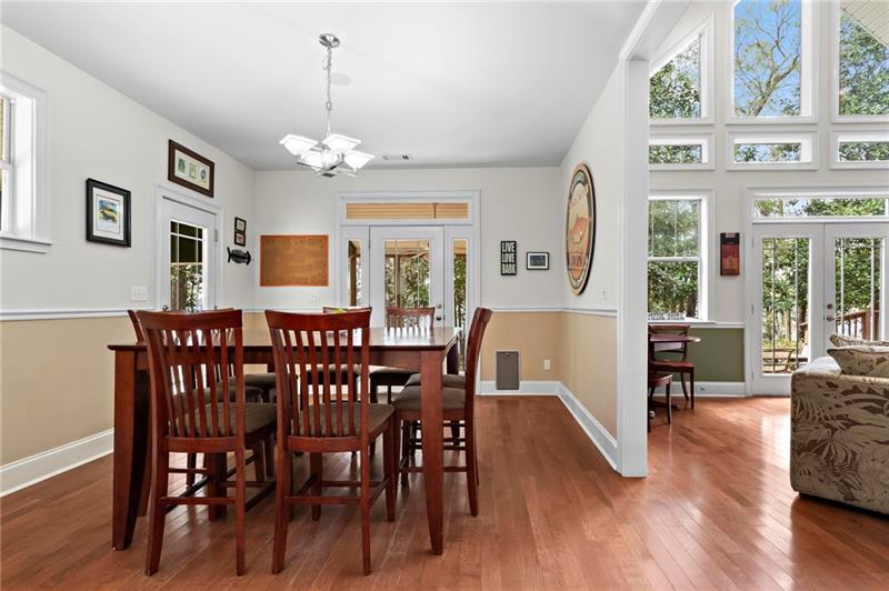 12 Rosalyn Road Georgetown, GA 39854 - Photo 18 of 102 a view of a dining room with furniture window and wooden floor