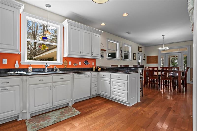 12 Rosalyn Road Georgetown, GA 39854 - Photo 22 of 102 a kitchen with stainless steel appliances granite countertop a stove and cabinets