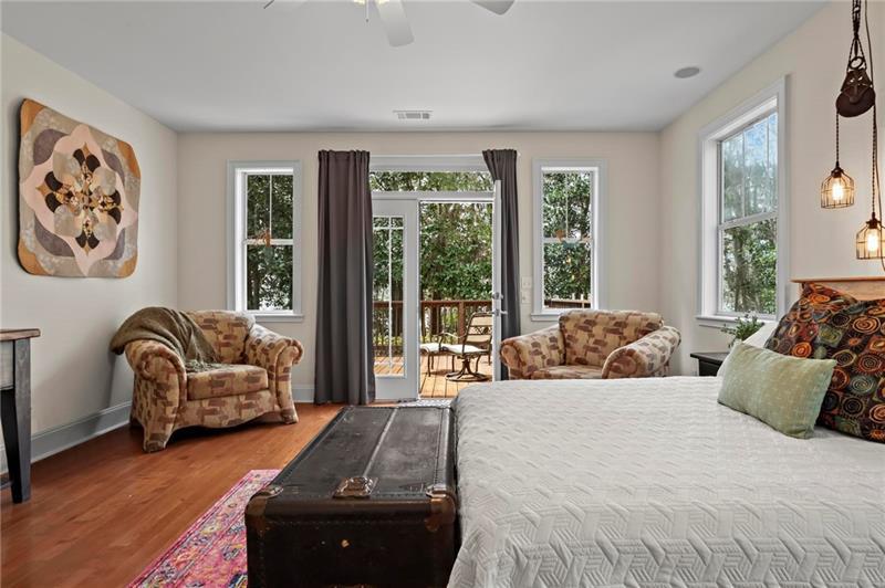 12 Rosalyn Road Georgetown, GA 39854 - Photo 26 of 102 a bedroom with furniture and large windows