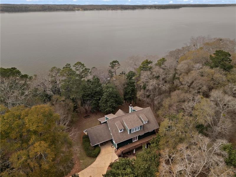 12 Rosalyn Road Georgetown, GA 39854 - Photo 3 of 102 an aerial view of a house with a yard and lake view