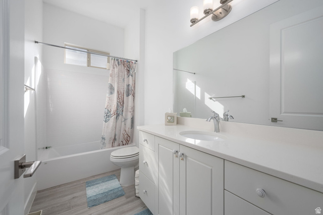 4708 Martin Drive St. George, UT 84790 - Photo 21 of 28 Full bathroom with shower / tub combo, vanity, and light wood-type flooring