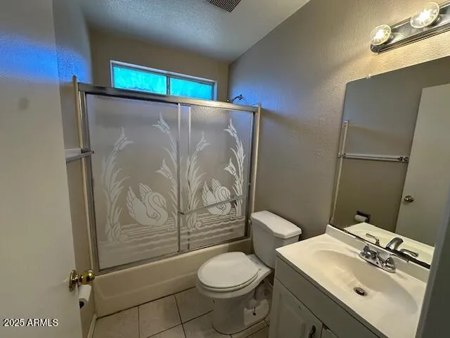 a large kitchen with a stove a sink dishwasher and a refrigerator