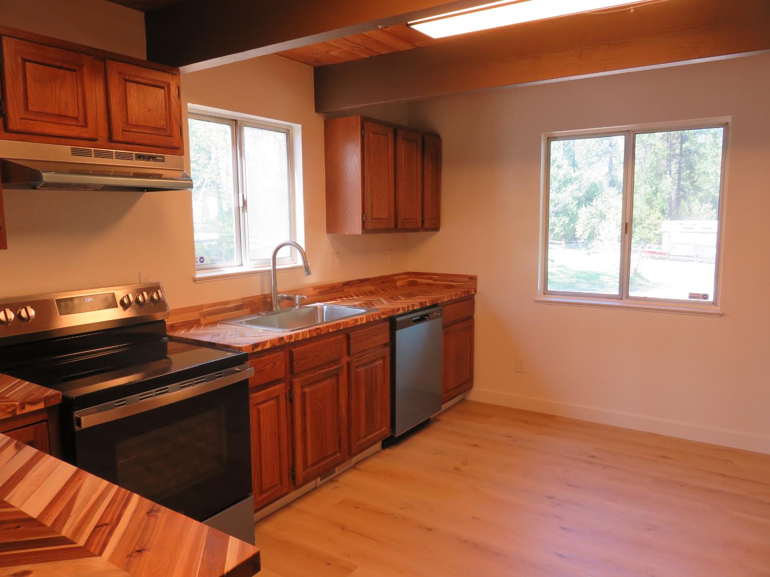 190 Bald Mountain Road West Point, CA 95255 - Photo 18 of 48 a kitchen with a sink stove and cabinets