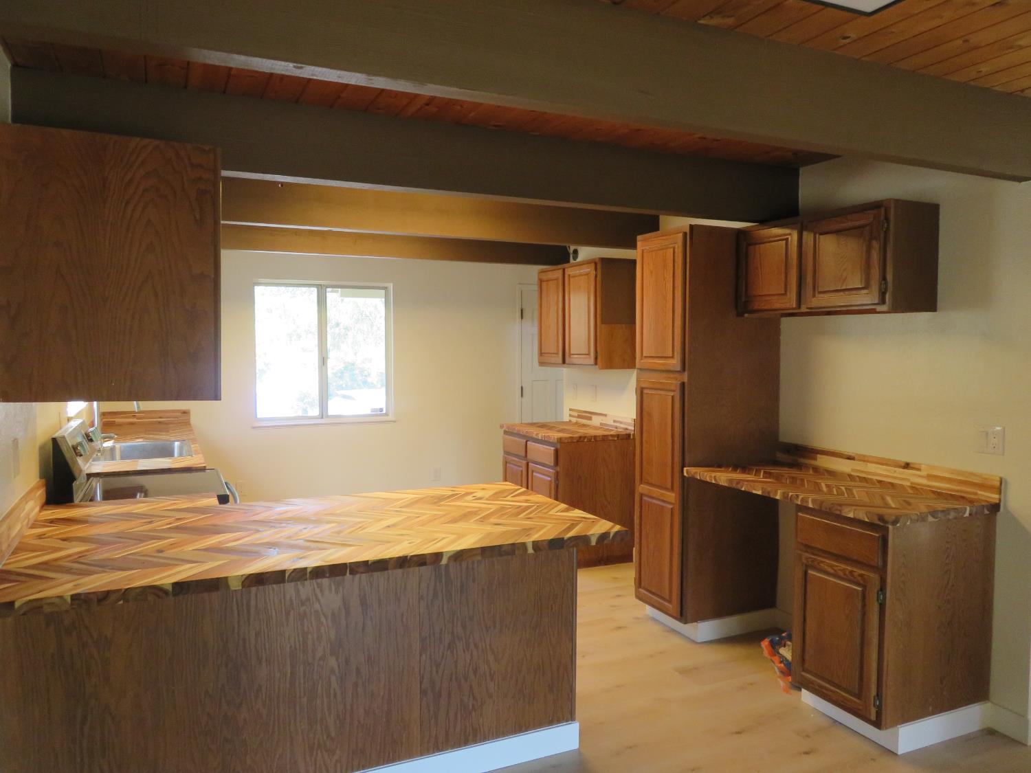 190 Bald Mountain Road West Point, CA 95255 - Photo 19 of 48 a bedroom with a bed and wooden floor
