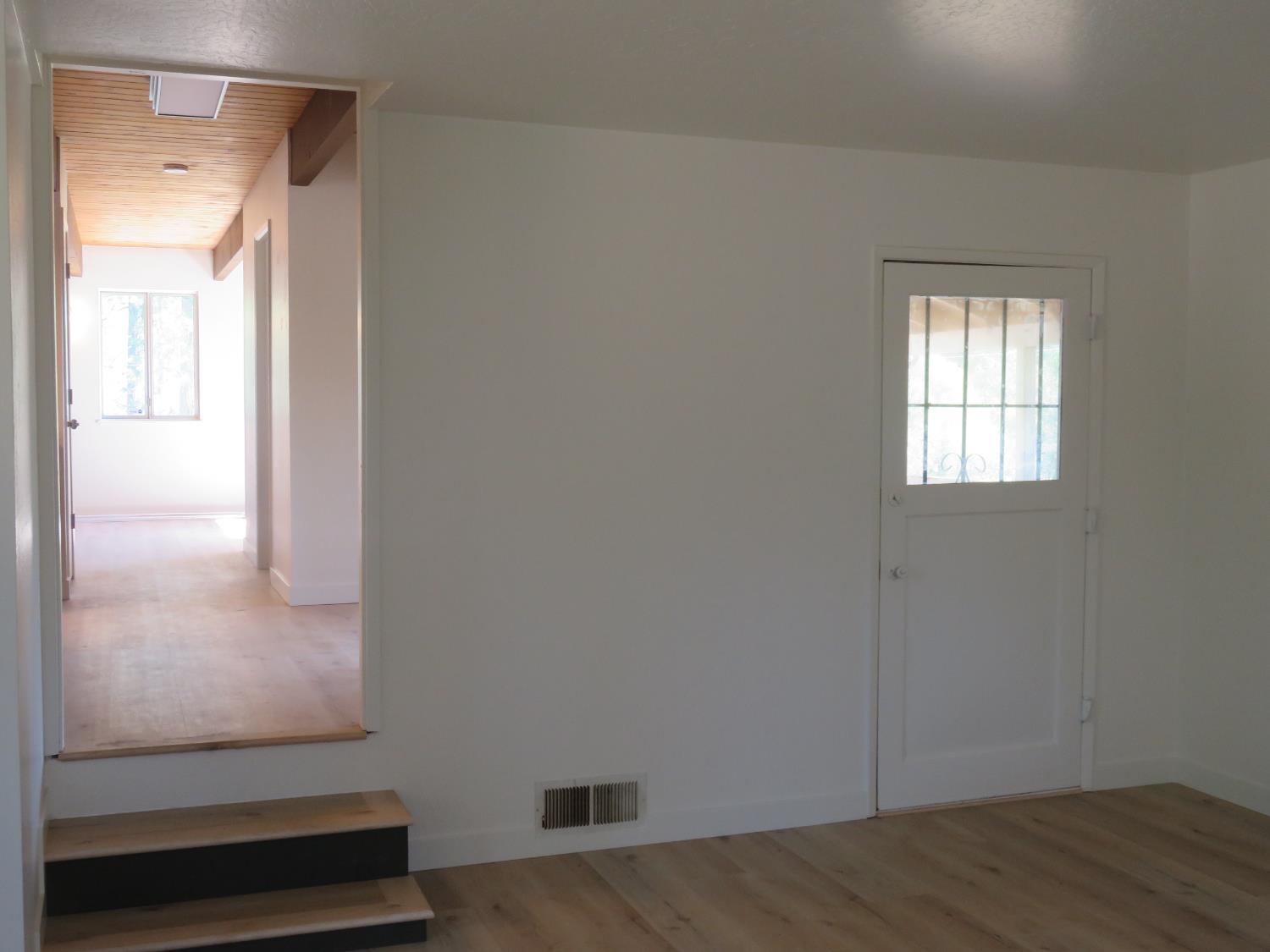 190 Bald Mountain Road West Point, CA 95255 - Photo 25 of 48 a view of an empty room and wooden floor