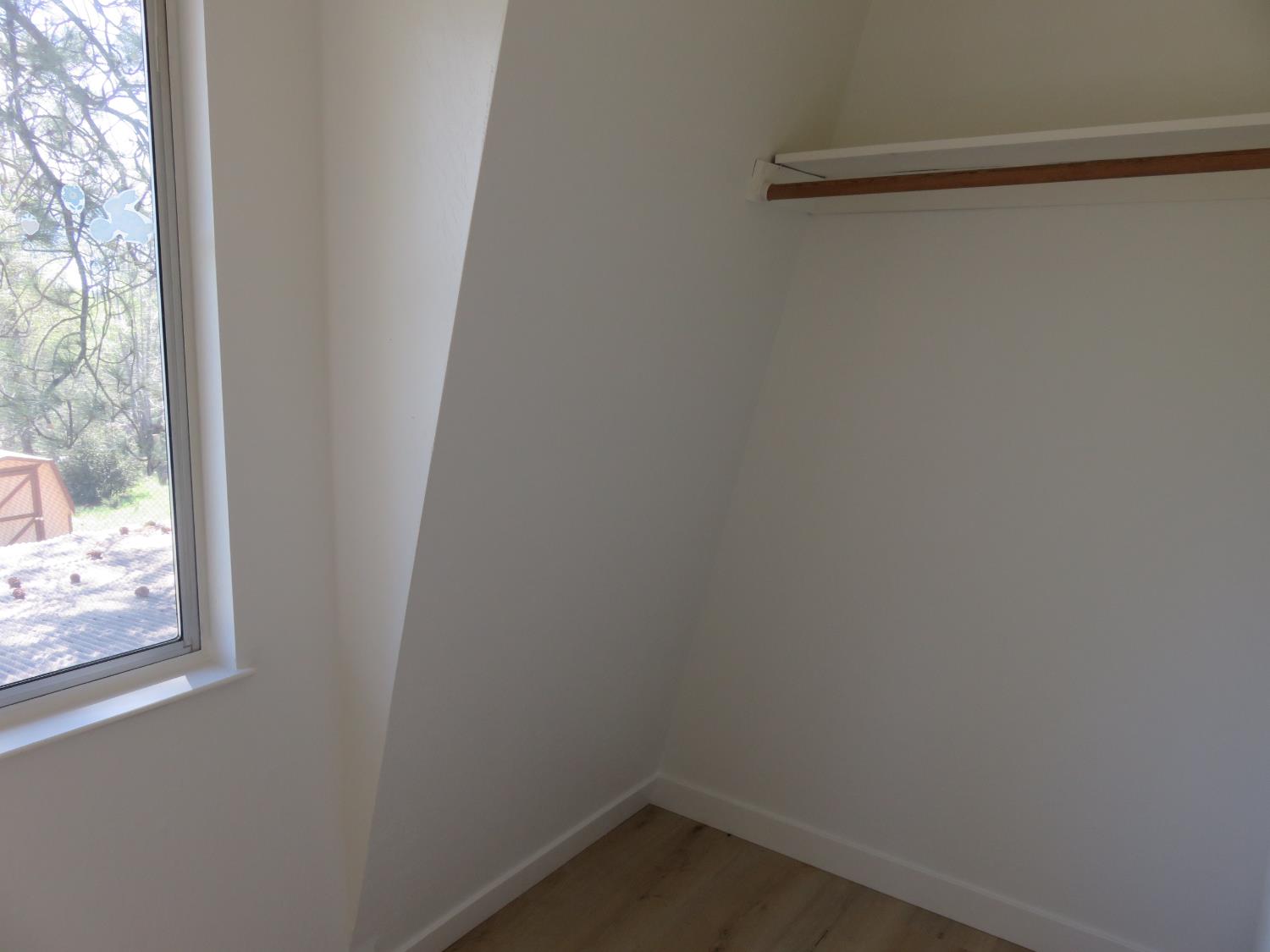 190 Bald Mountain Road West Point, CA 95255 - Photo 31 of 48 a small space with wooden floor and a window
