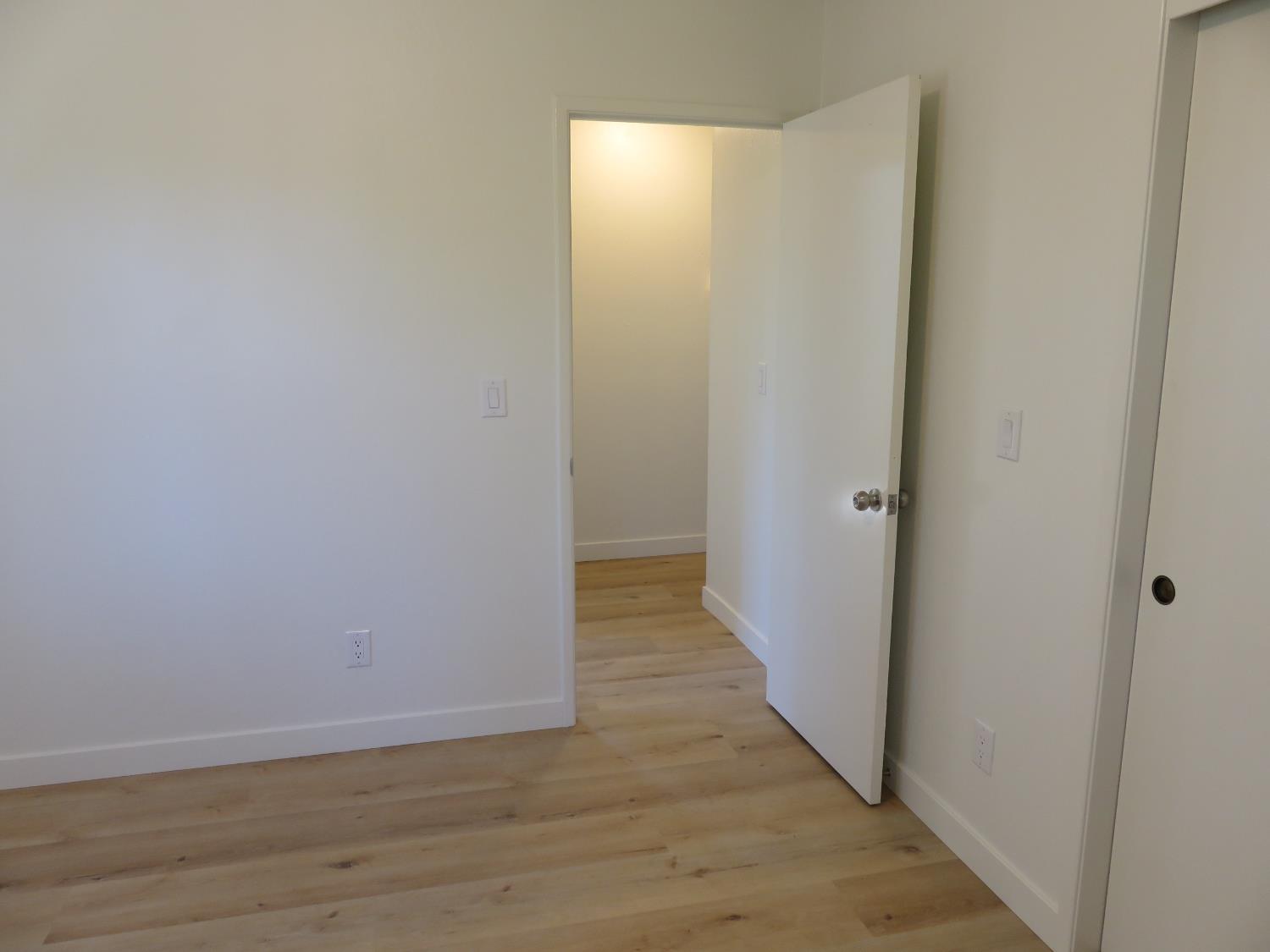 190 Bald Mountain Road West Point, CA 95255 - Photo 39 of 48 a view of a hallway with wooden floor