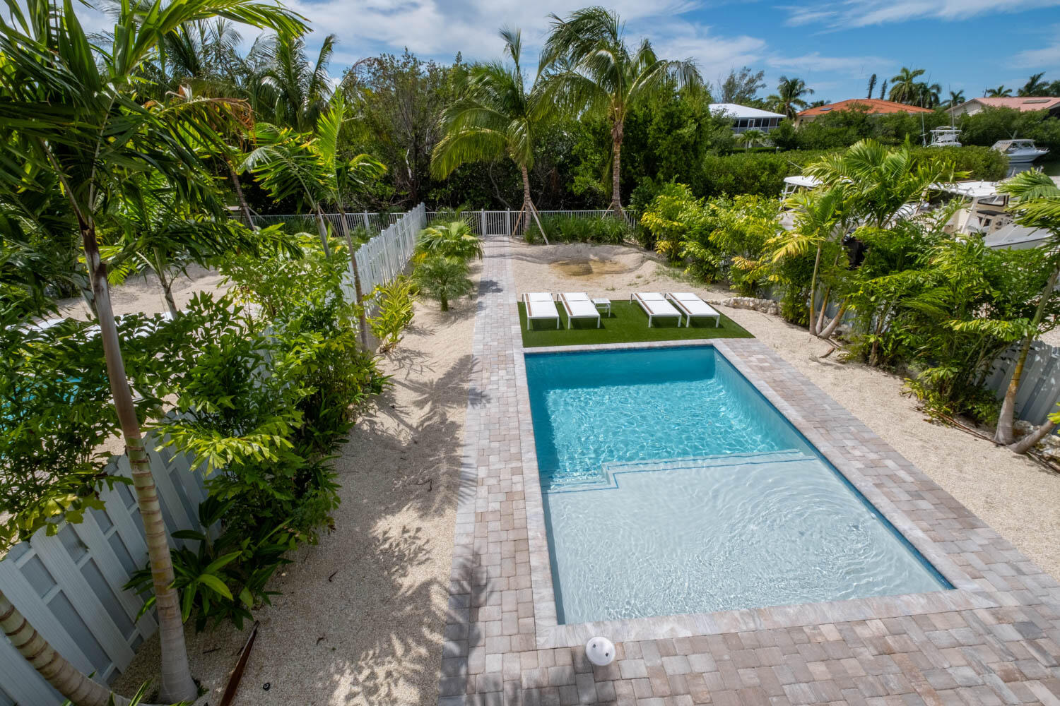 611 Sombrero Beach Road Marathon, FL 33050 - Photo 16 of 51 a view of a yard with an outdoor seating