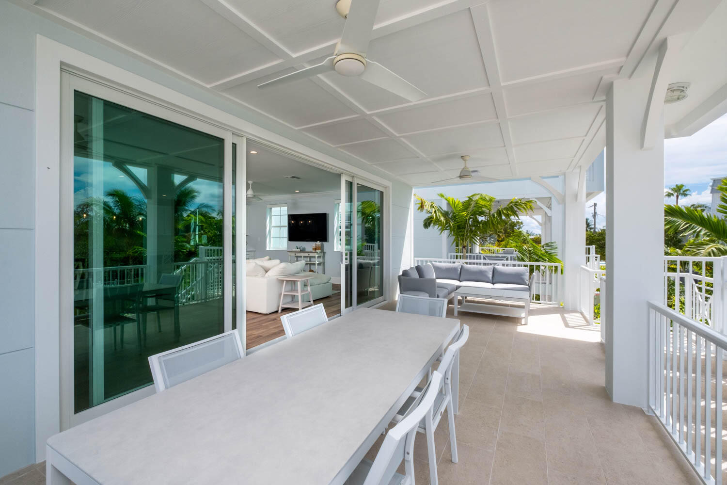 611 Sombrero Beach Road Marathon, FL 33050 - Photo 22 of 51 a living room with furniture and a flat screen tv