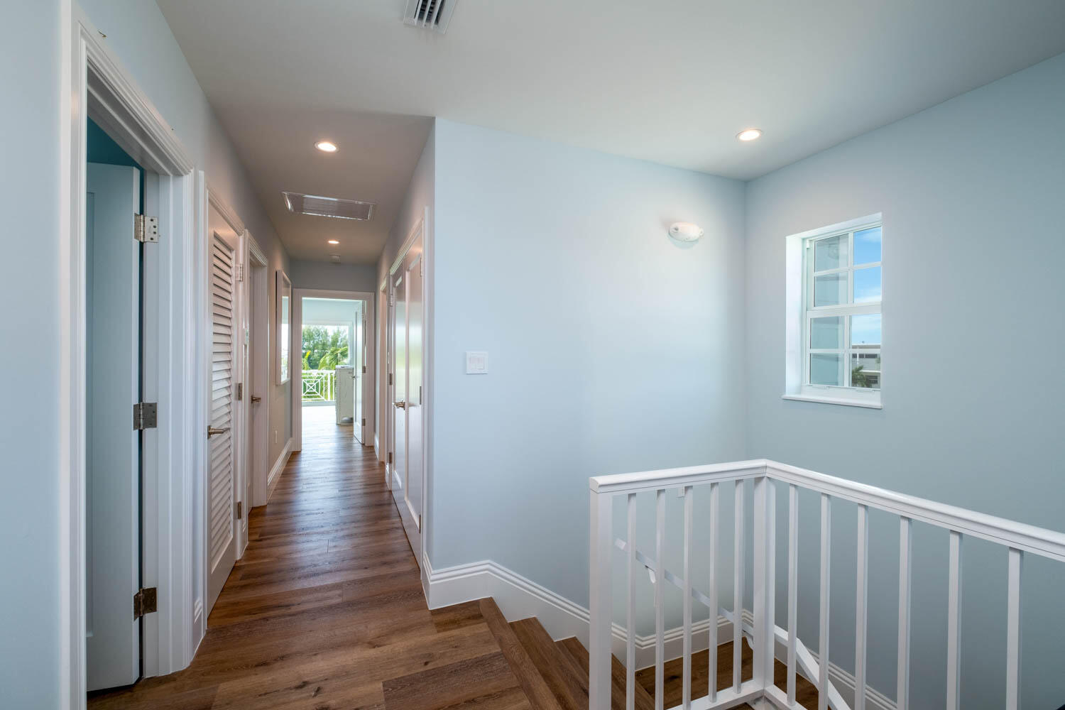 611 Sombrero Beach Road Marathon, FL 33050 - Photo 37 of 51 a view of a hallway with wooden floor