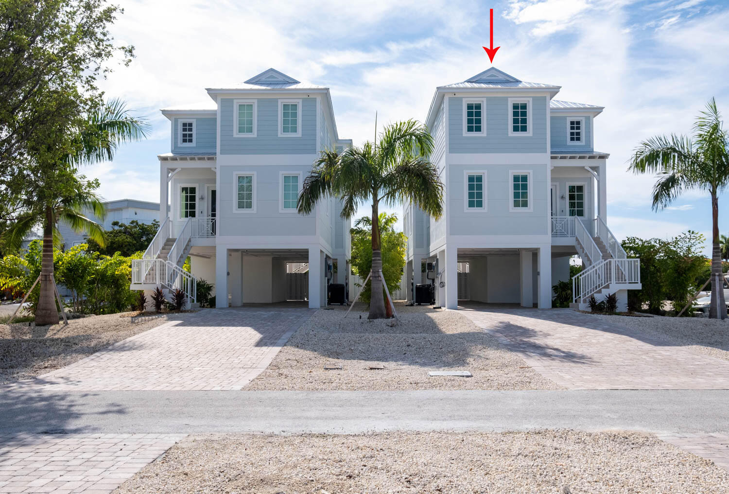 611 Sombrero Beach Road Marathon, FL 33050 - Photo 4 of 51 a front view of a house with yard and parking