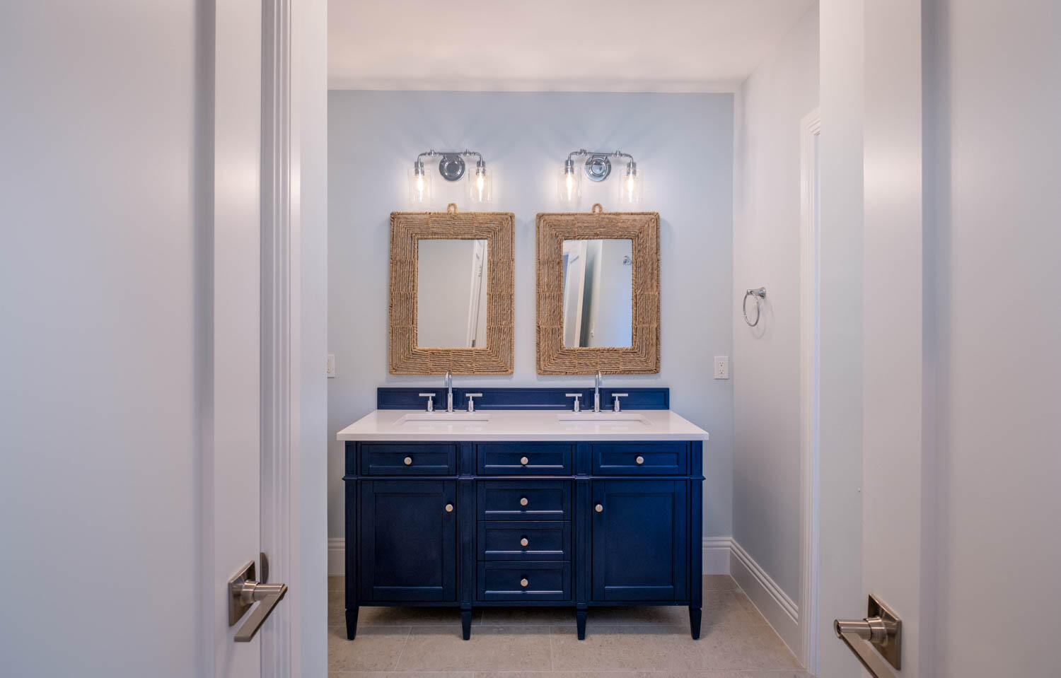 611 Sombrero Beach Road Marathon, FL 33050 - Photo 48 of 51 a bathroom with a double vanity sink and mirror