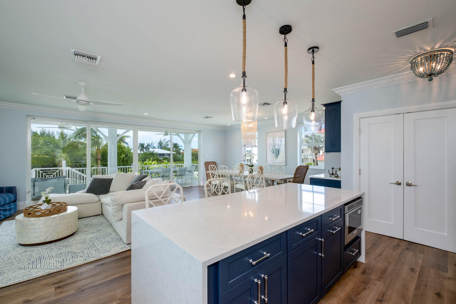 611 Sombrero Beach Road Marathon, FL 33050 - Photo 10 of 51 a kitchen with kitchen island and large windows