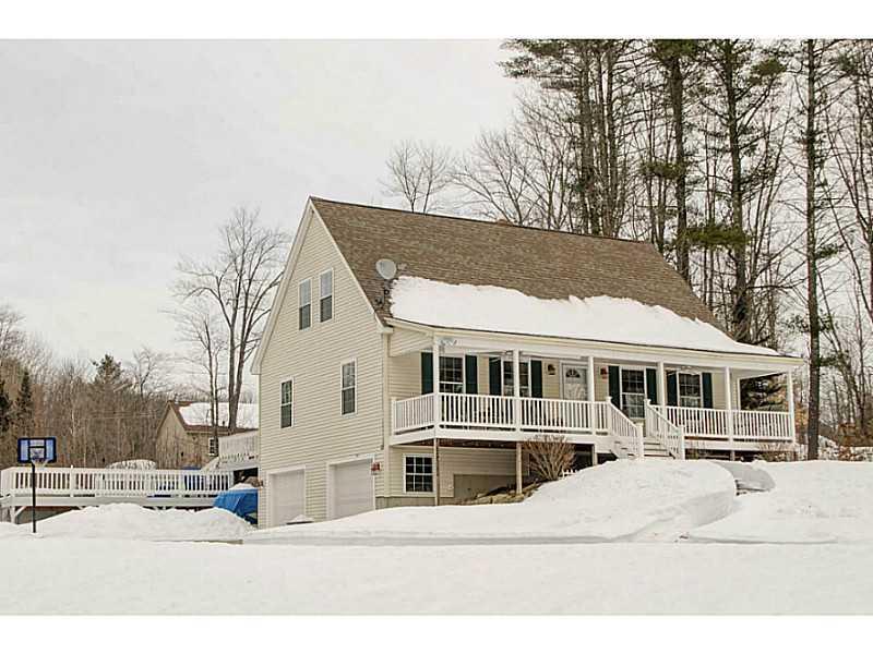 344 Windham Center Road Windham, ME 04062 - Photo 2 of 27 Exterior Front. Two car garage entry...