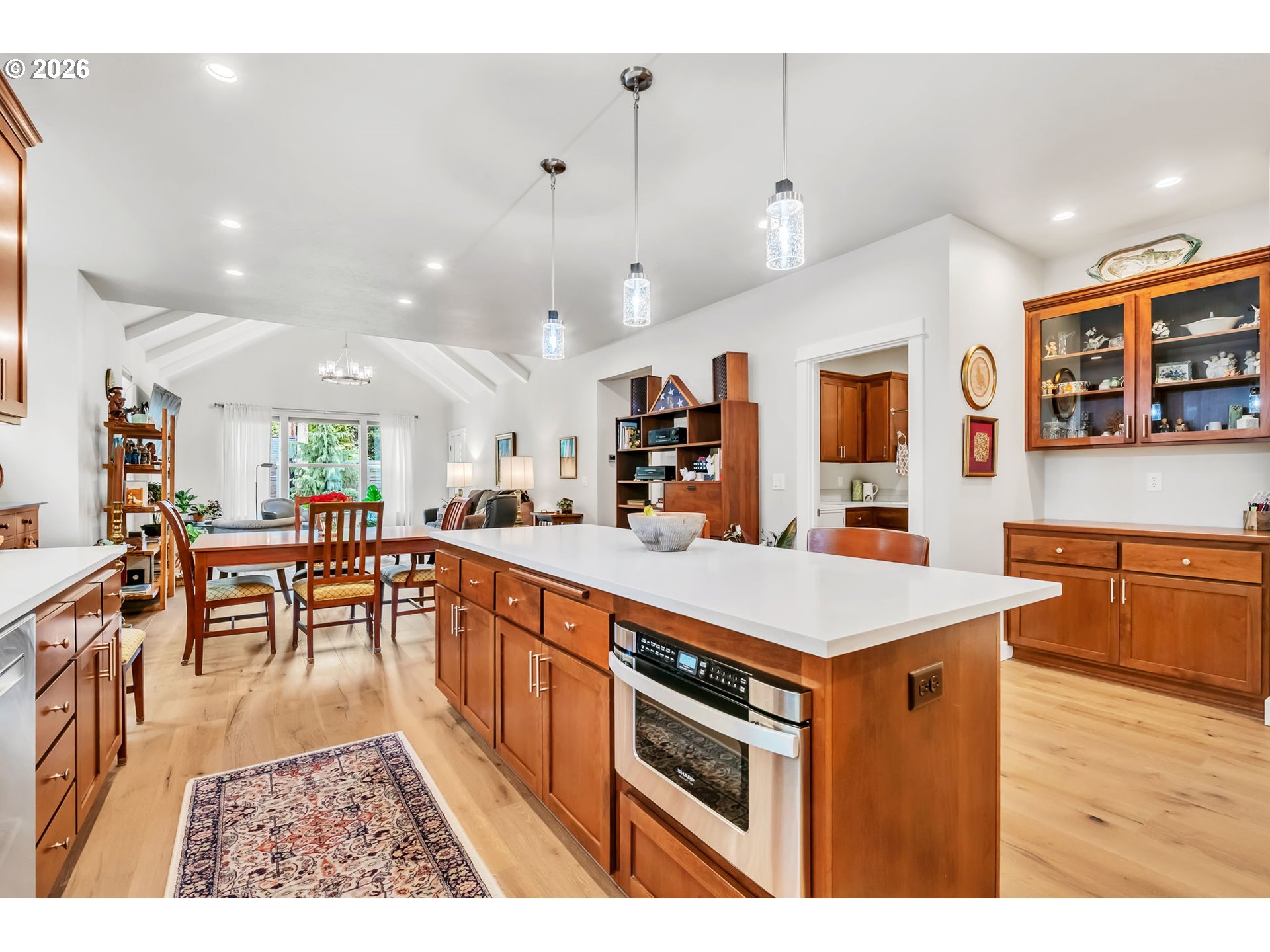 444 Emily Lane Eugene, OR 97404 - Photo 15 of 47 a kitchen with stainless steel appliances granite countertop a kitchen island a stove and a sink