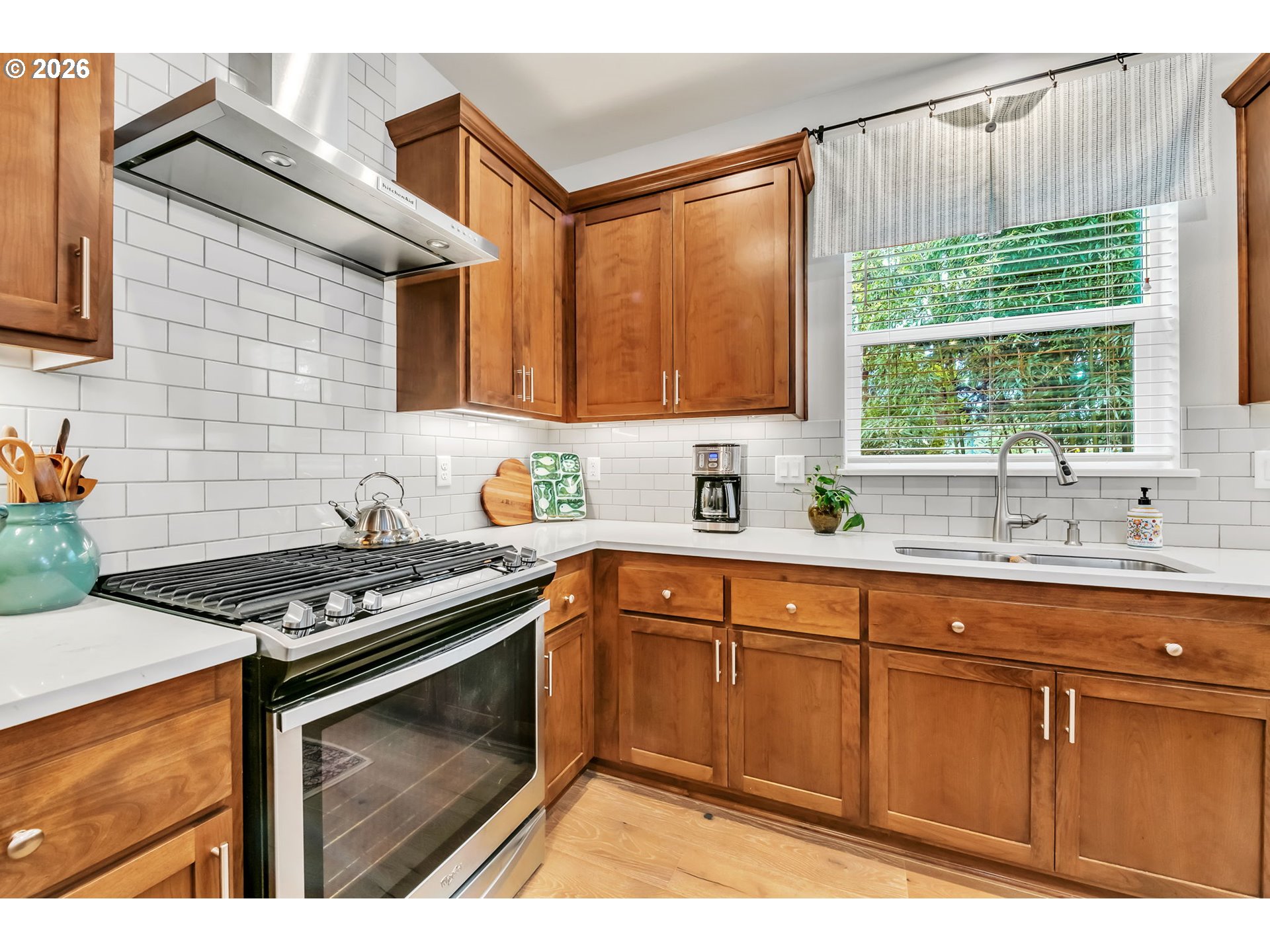 444 Emily Lane Eugene, OR 97404 - Photo 16 of 47 a kitchen with stainless steel appliances granite countertop a stove and a sink