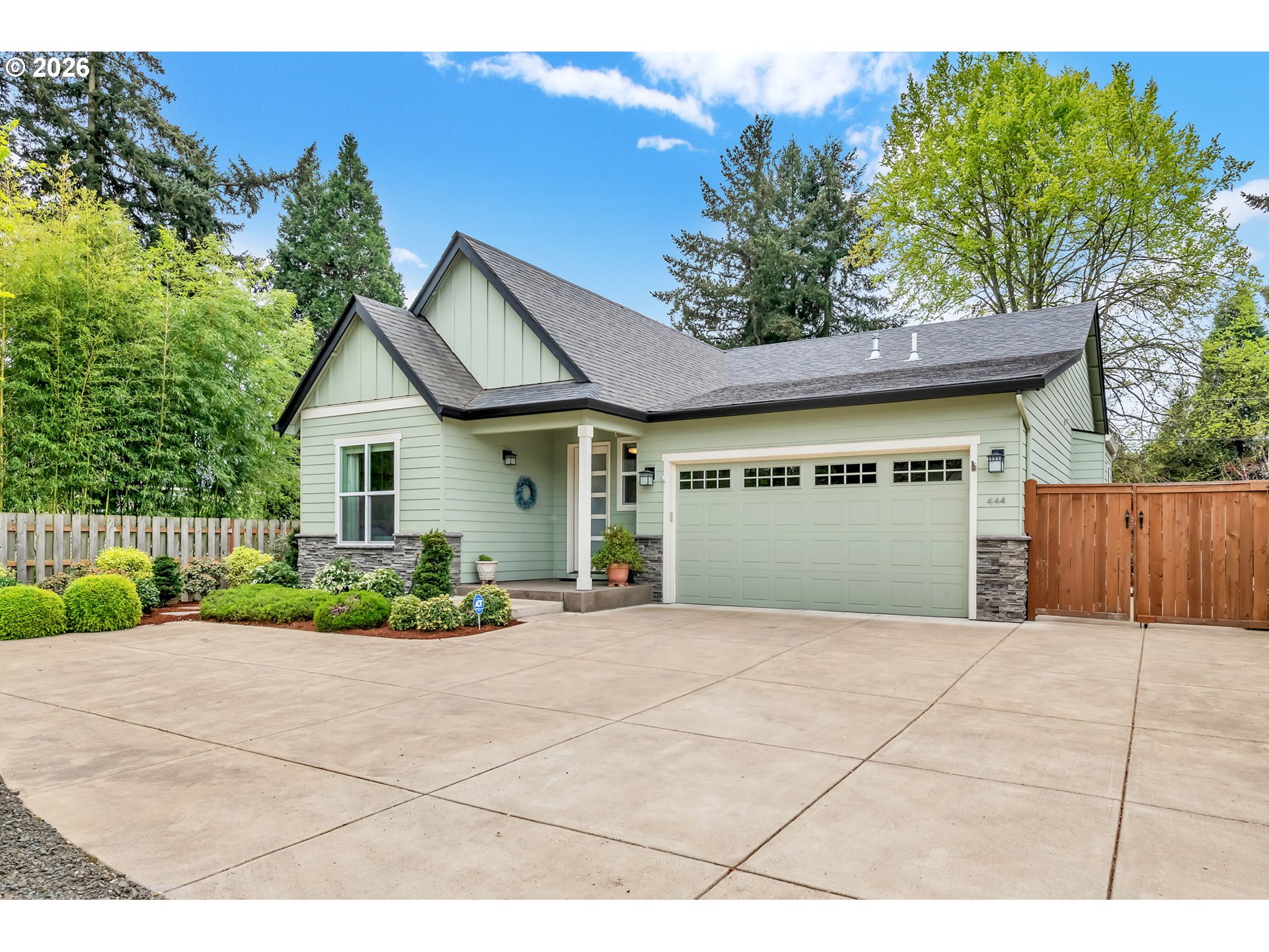 444 Emily Lane Eugene, OR 97404 - Photo 2 of 47 a view of a house with a yard and potted plants